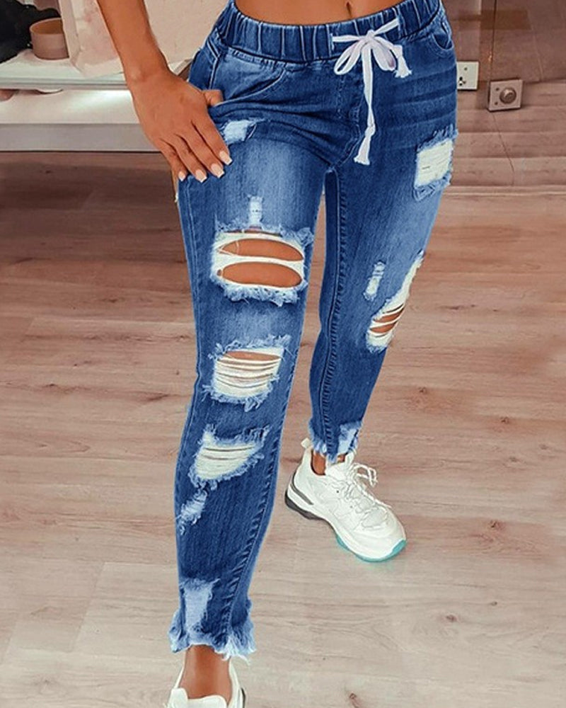 Jeans strappati in vita elastica per le donne